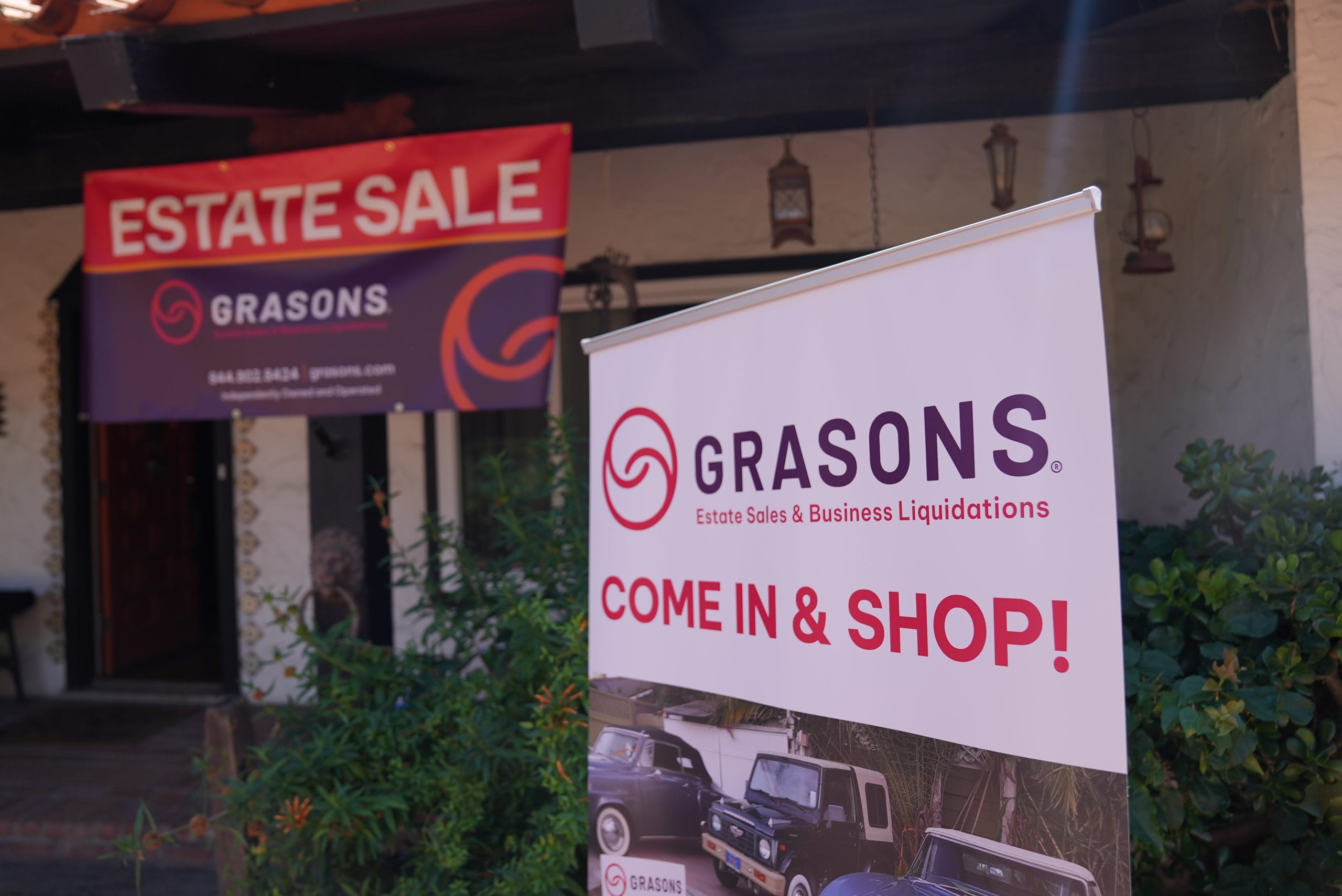 Signs indicate a managed business liquidation inside a building.
